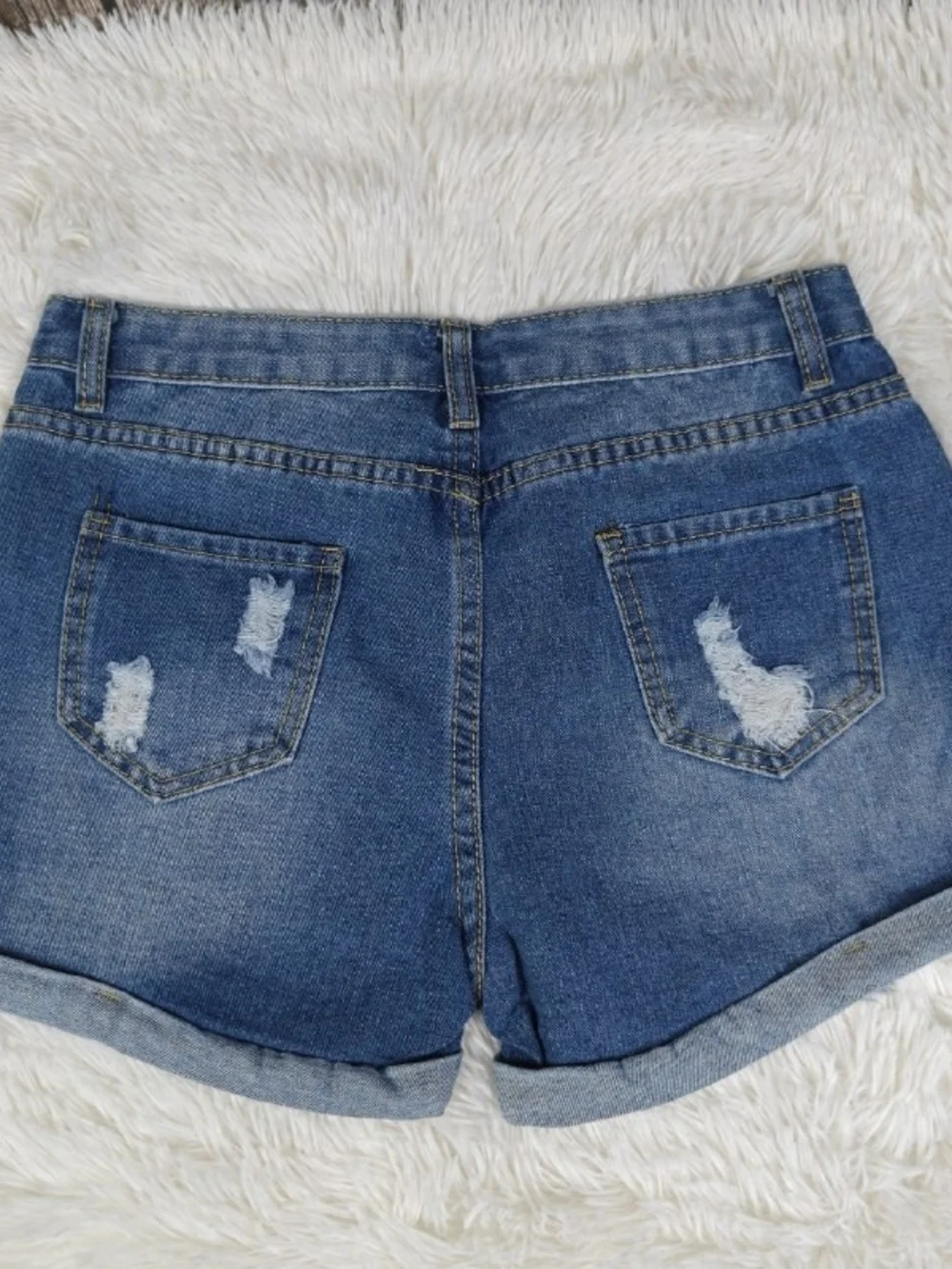 Distressed Blue Denim Shorts with Champion Patch